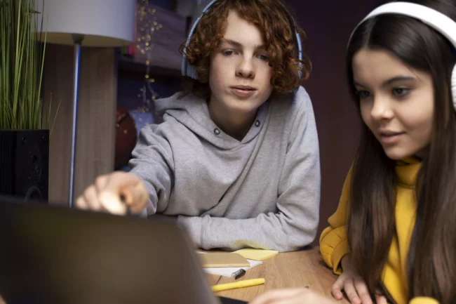 AnyConv.com__two-teenage-friends-playing-video-games-together-home edtech
